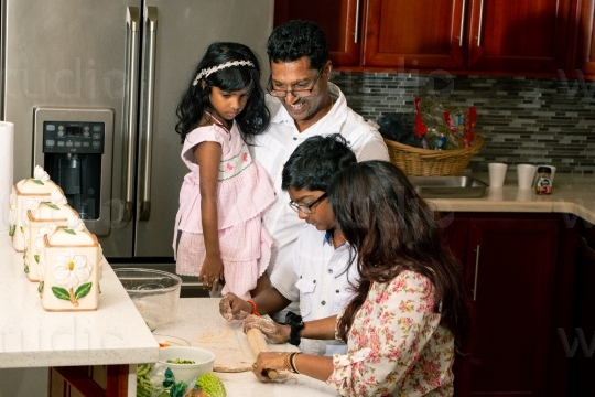 Family in Kitchen III