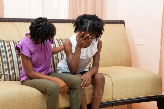 Girl Comforting her  Sister