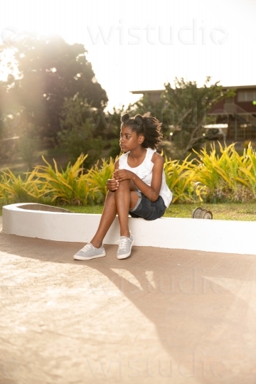 Girl Sitting Outside