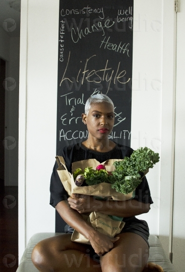 Healthy Woman sitting with Vegetables II