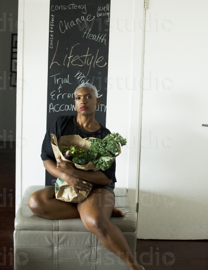 Healthy Woman sitting with Vegetables III