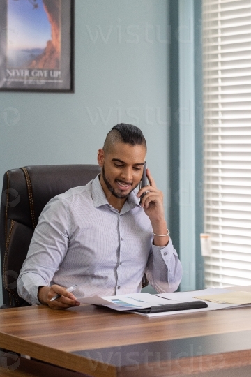 Male employee on phone