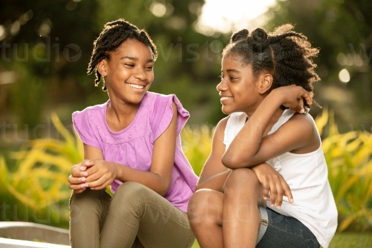 Sisters Chatting Outside