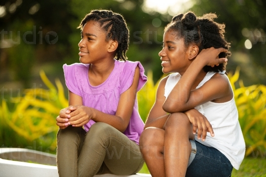 Sisters Sitting Outside