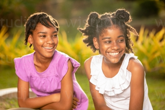 Sisters Smiling Outside