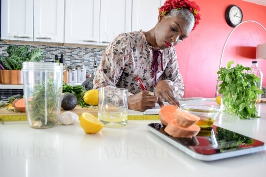 Woman in Kitchen with Vegetables III
