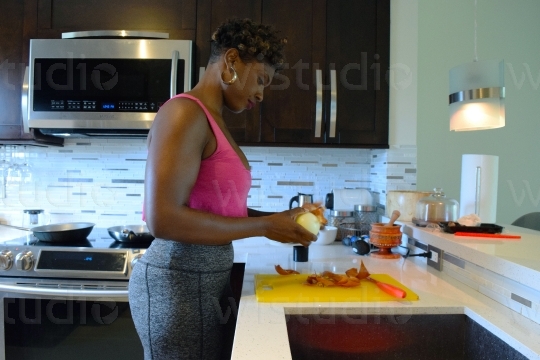 Woman prepping food in the Kitchen