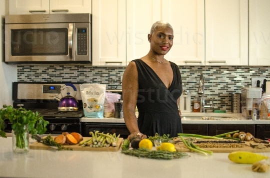 Woman Standing in Kitchen