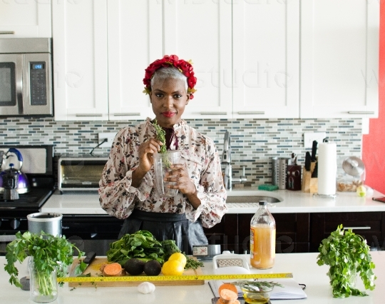 Woman wit Vegetables in Kitchen III